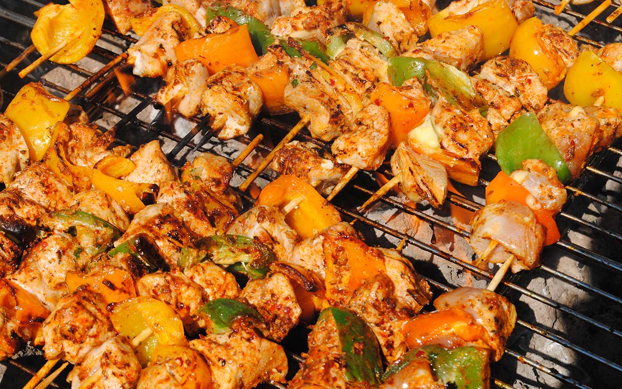 Mediterranean souvlaki sizzling on a summer's day