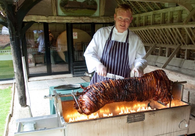 Matt cooking up a fine hog